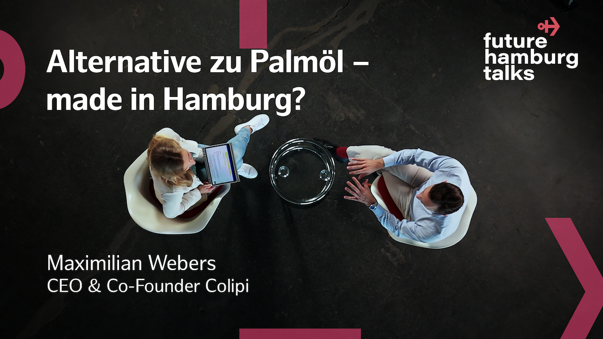 Zwei Personen im Gespräch bei future hamburg talks über Palmöl-Alternativen, Blick von oben.