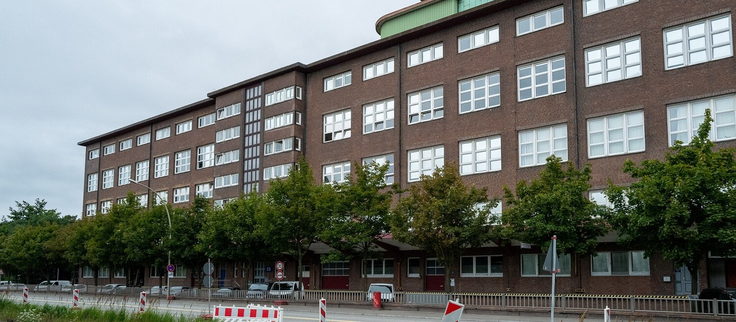 Office and administration building on a street on the Peute