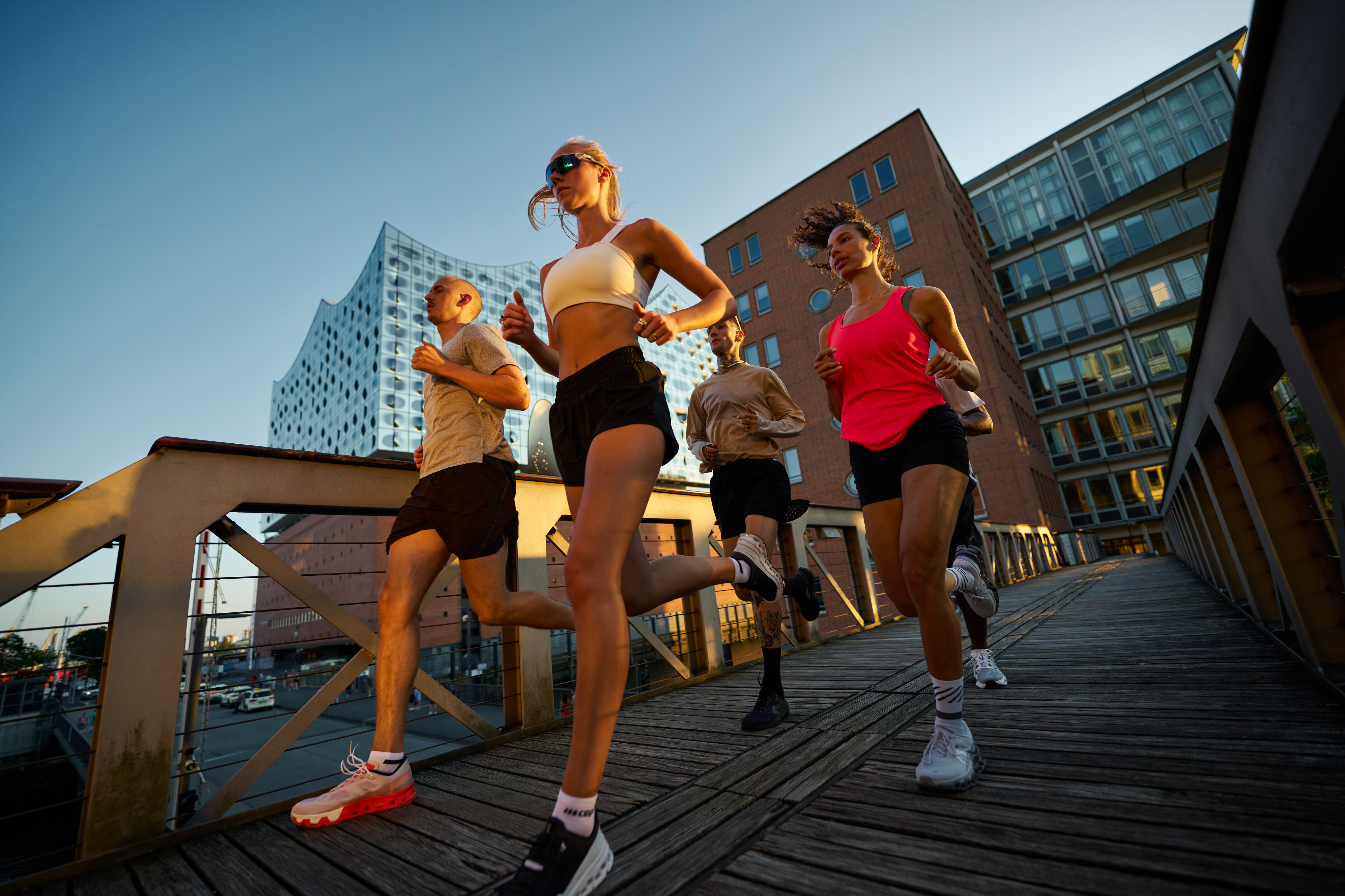 Young people run through Hamburg's city center