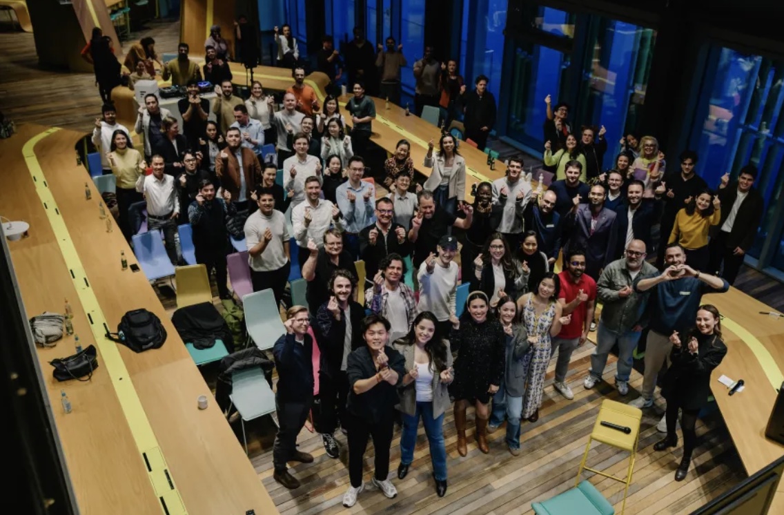 Migrant founders in conference room