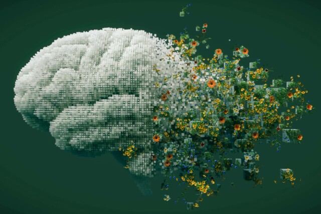 Digitaler Gehirnwürfel, der sich in bunte Blumen auflöst, vor grünem Hintergrund.