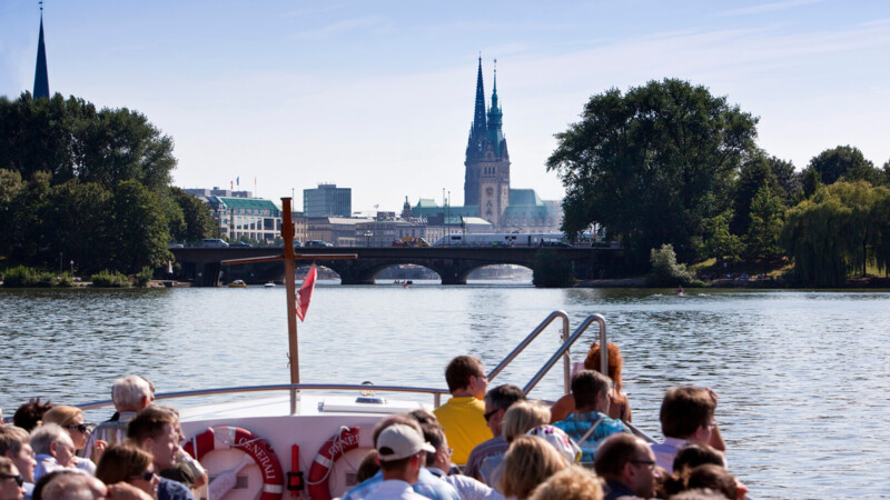 Tourists on a boat cruise along the Inner Alster Lake 