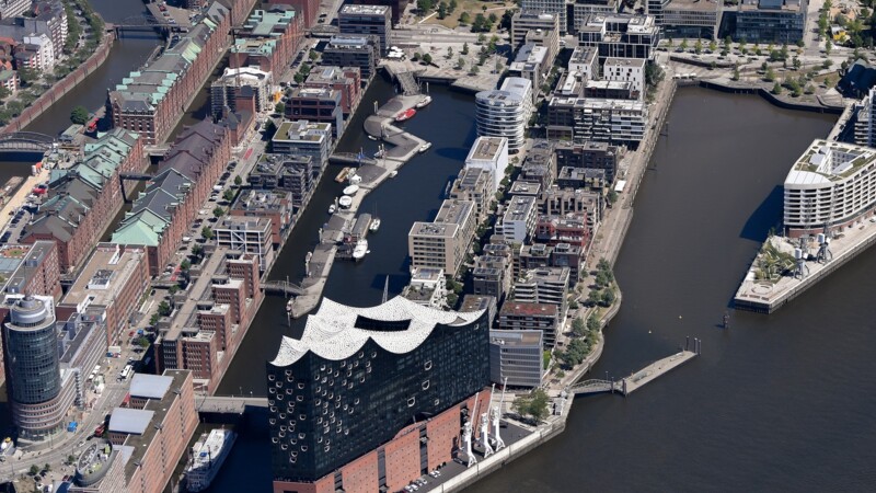 Aerial view of Hamburg’s Elbphilharmonie concert hall and surrounding HafenCity waterfront district.